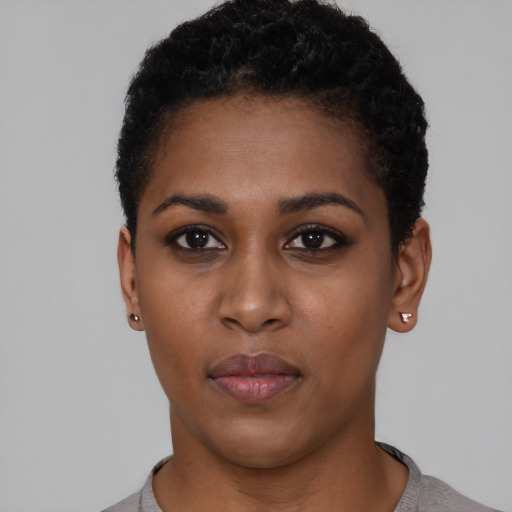 Neutral black young-adult female with short  black hair and brown eyes