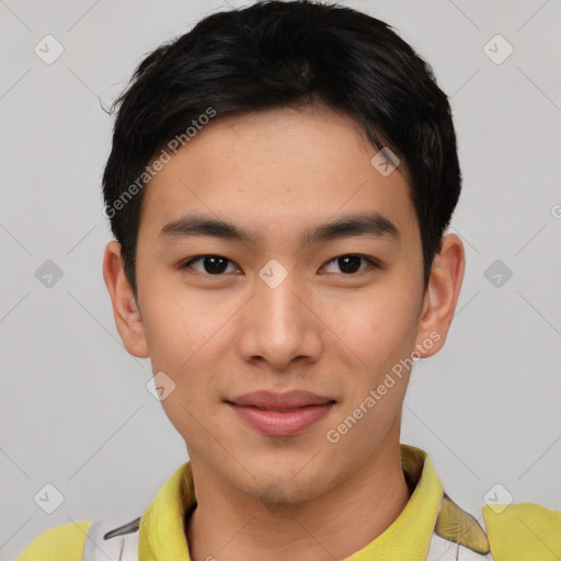 Joyful asian young-adult male with short  black hair and brown eyes