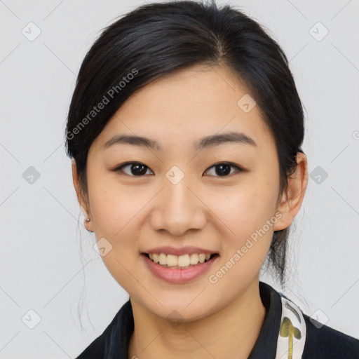 Joyful asian young-adult female with medium  black hair and brown eyes