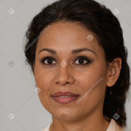 Joyful latino adult female with medium  brown hair and brown eyes