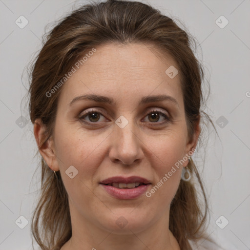 Joyful white adult female with medium  brown hair and brown eyes