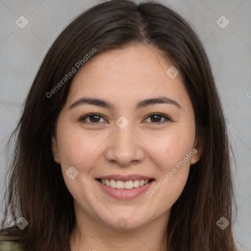 Joyful white young-adult female with long  brown hair and brown eyes