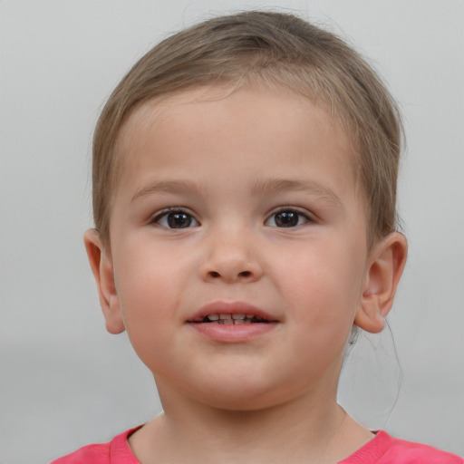 Joyful white child male with short  brown hair and brown eyes