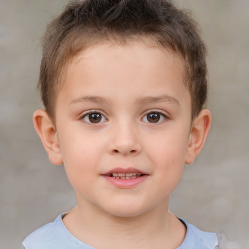 Joyful white child male with short  brown hair and brown eyes