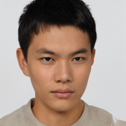 Neutral asian young-adult male with short  brown hair and brown eyes