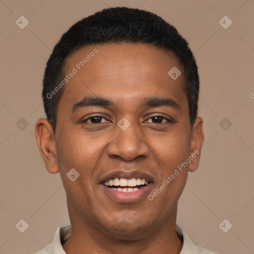 Joyful black young-adult male with short  black hair and brown eyes