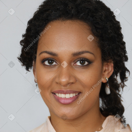 Joyful black young-adult female with medium  brown hair and brown eyes