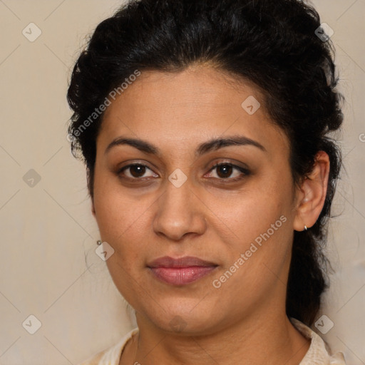 Joyful latino young-adult female with medium  brown hair and brown eyes