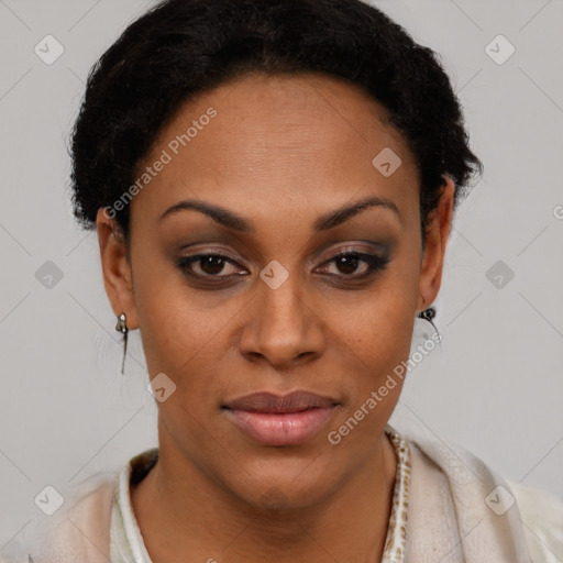 Joyful latino young-adult female with short  brown hair and brown eyes