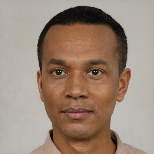 Neutral black adult male with short  black hair and brown eyes