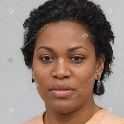 Neutral black young-adult female with short  brown hair and brown eyes