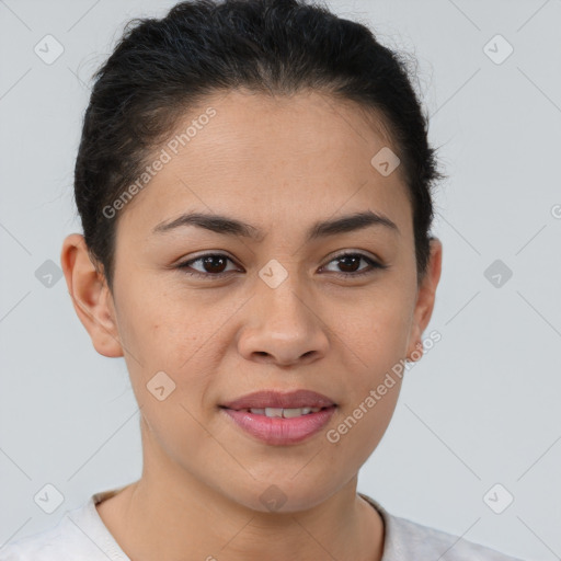 Joyful latino young-adult female with short  brown hair and brown eyes