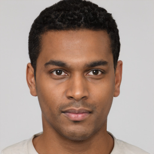 Neutral black young-adult male with short  black hair and brown eyes