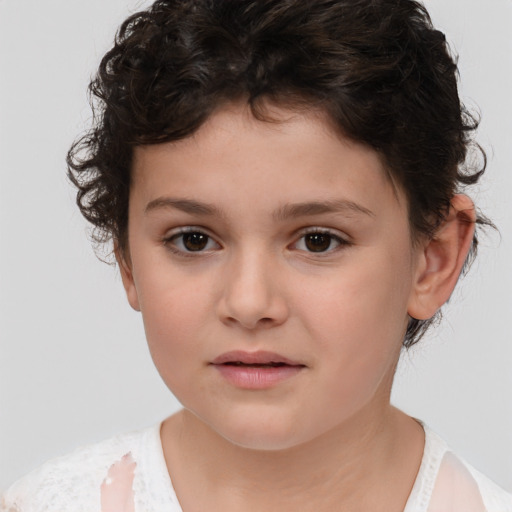 Joyful white child female with short  brown hair and brown eyes