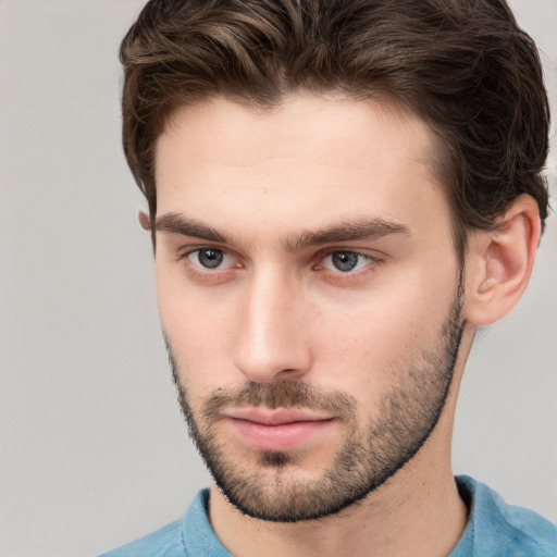 Neutral white young-adult male with short  brown hair and brown eyes