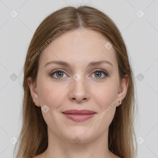 Joyful white young-adult female with long  brown hair and grey eyes