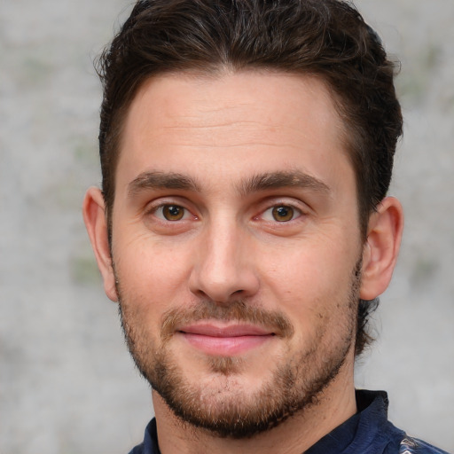 Joyful white young-adult male with short  brown hair and brown eyes