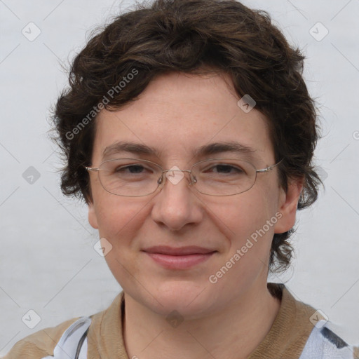 Joyful white adult female with medium  brown hair and blue eyes