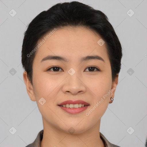 Joyful asian young-adult female with short  brown hair and brown eyes