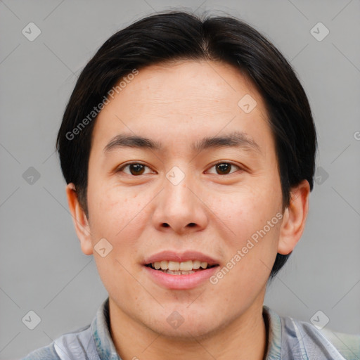 Joyful asian young-adult male with short  brown hair and brown eyes