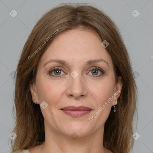 Joyful white adult female with medium  brown hair and grey eyes