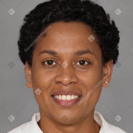 Joyful latino adult female with short  brown hair and brown eyes