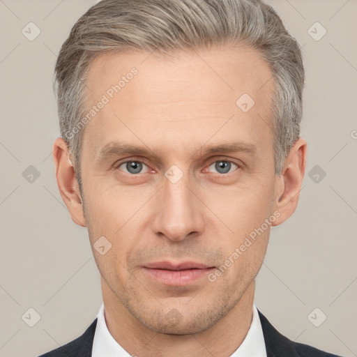 Neutral white adult male with short  brown hair and brown eyes