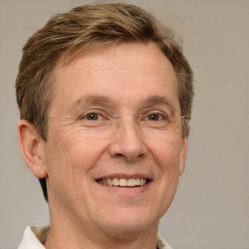 Joyful white middle-aged male with short  brown hair and grey eyes