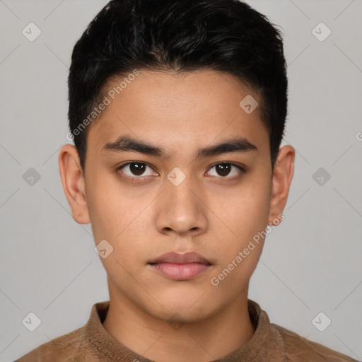 Neutral latino young-adult male with short  brown hair and brown eyes