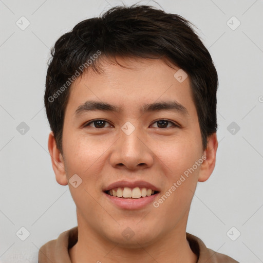 Joyful asian young-adult male with short  brown hair and brown eyes