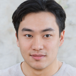 Neutral asian young-adult male with short  brown hair and brown eyes