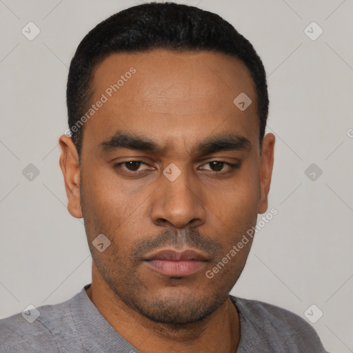 Neutral latino young-adult male with short  black hair and brown eyes