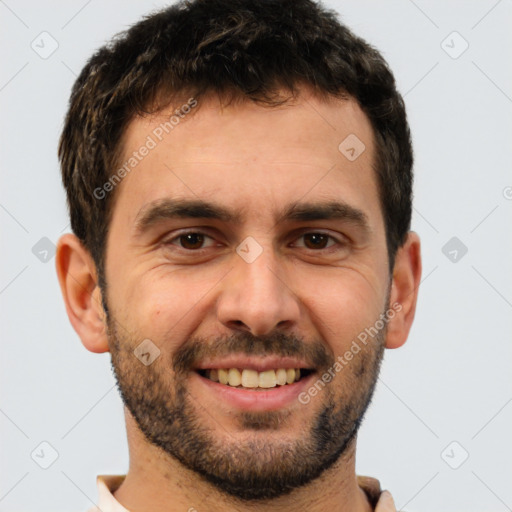 Joyful white young-adult male with short  brown hair and brown eyes