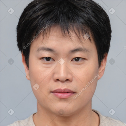 Neutral asian young-adult male with short  brown hair and brown eyes