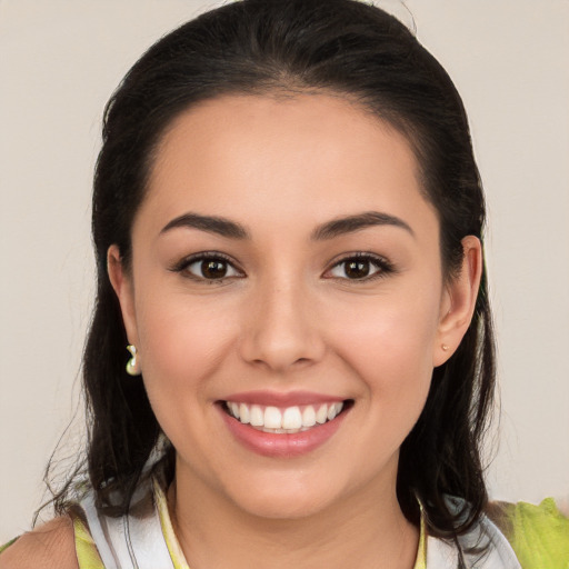 Joyful white young-adult female with medium  brown hair and brown eyes