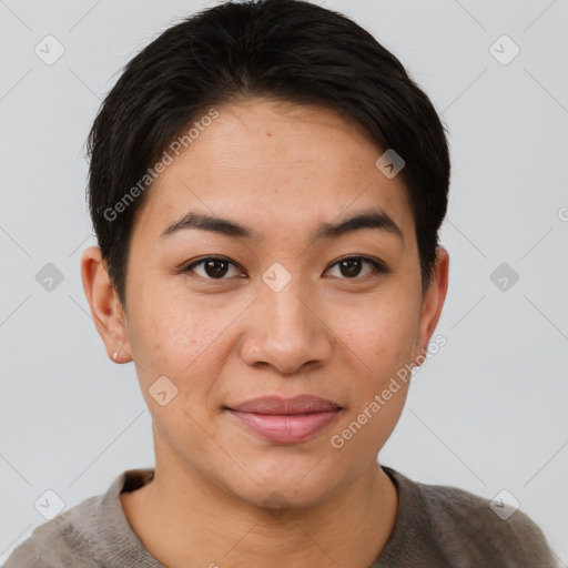 Joyful asian young-adult female with short  brown hair and brown eyes