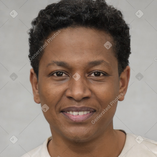 Joyful black young-adult male with short  brown hair and brown eyes