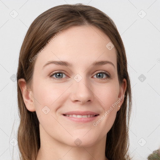 Joyful white young-adult female with long  brown hair and grey eyes