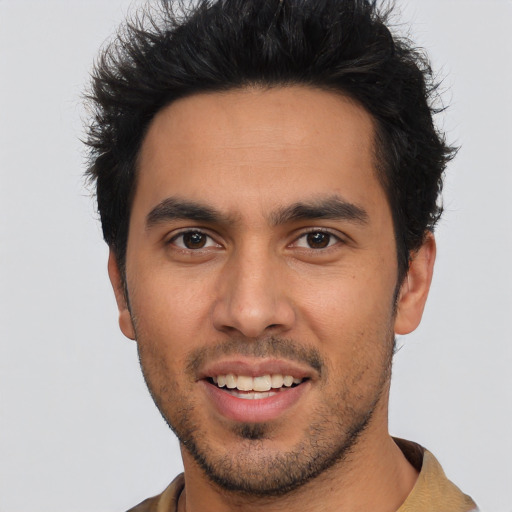 Joyful asian young-adult male with short  black hair and brown eyes