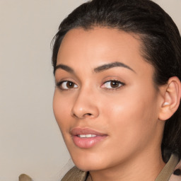 Joyful white young-adult female with medium  black hair and brown eyes