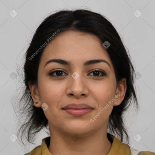 Joyful latino young-adult female with medium  brown hair and brown eyes