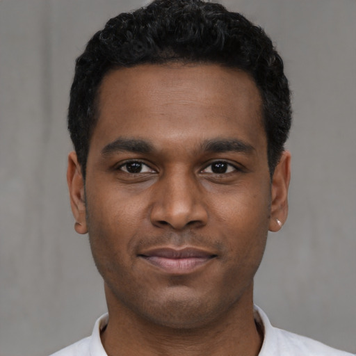 Neutral black young-adult male with short  brown hair and brown eyes