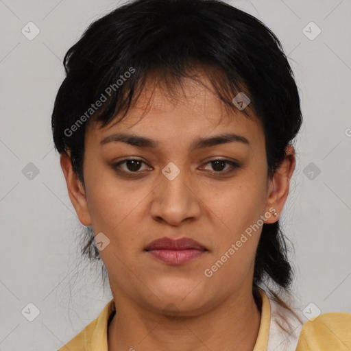 Joyful latino young-adult female with short  black hair and brown eyes