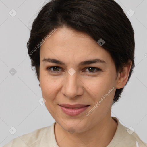 Joyful white young-adult female with medium  brown hair and brown eyes