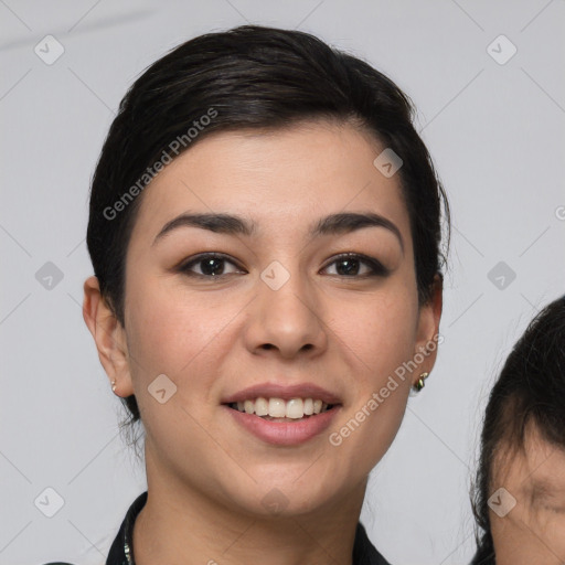 Joyful white young-adult female with medium  brown hair and brown eyes