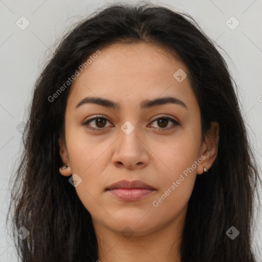 Joyful latino young-adult female with long  brown hair and brown eyes