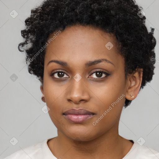 Neutral black young-adult female with short  brown hair and brown eyes