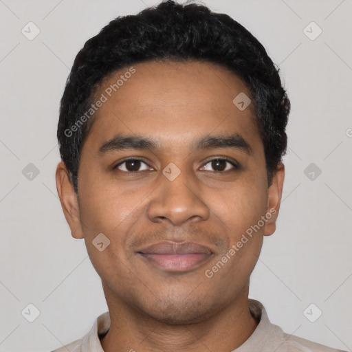 Joyful latino young-adult male with short  black hair and brown eyes
