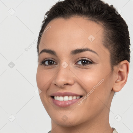 Joyful white young-adult female with short  brown hair and brown eyes