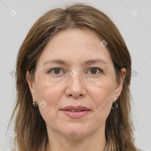 Joyful white adult female with medium  brown hair and grey eyes